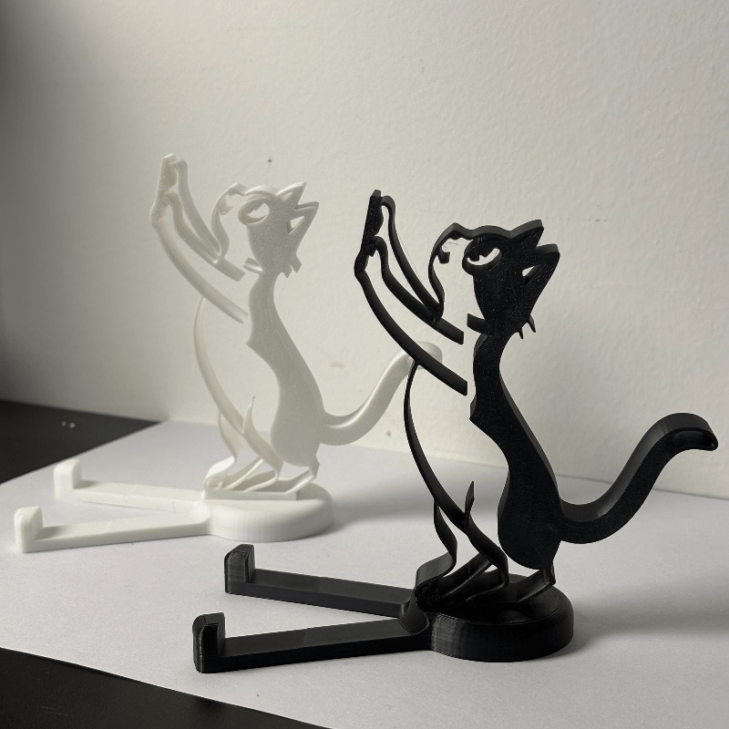 抽象的な中空ラインの猫型スマホスタンド、ミニマリストなキティ - Desk Setup Stand のレビューと価格